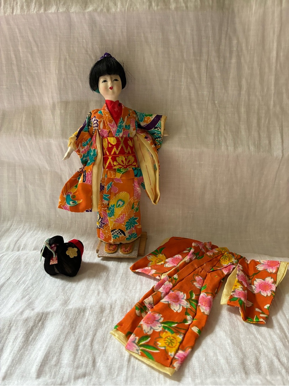Traditional Japanese Geisha Doll in Orange Kimono